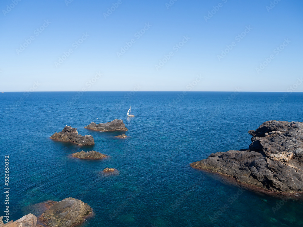 White yacht is on the blue sea. Spain