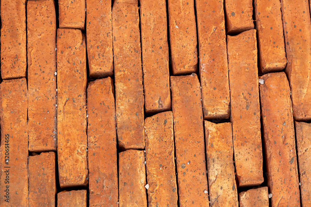 Newly laid red ground tile on a street Newly laid red ground tile on a street