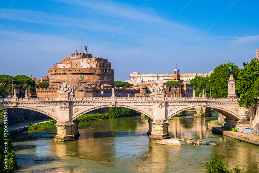 Rome, Italy - Panoramic view of Rome with Castle of St. Angel - Castel Sant’Angelo - and Ponte Vittorio Emanuele II bridge over the Tiber river Rome, Italy - Panoramic view of Rome with Castle of St. Angel - Castel Sant’Angelo - and Ponte Vittorio Emanuele II bridge over the Tiber river