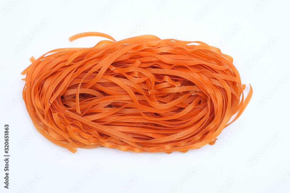 Isolated colored spaghetti nests on a white background. Isolated colored spaghetti nests on a white background.