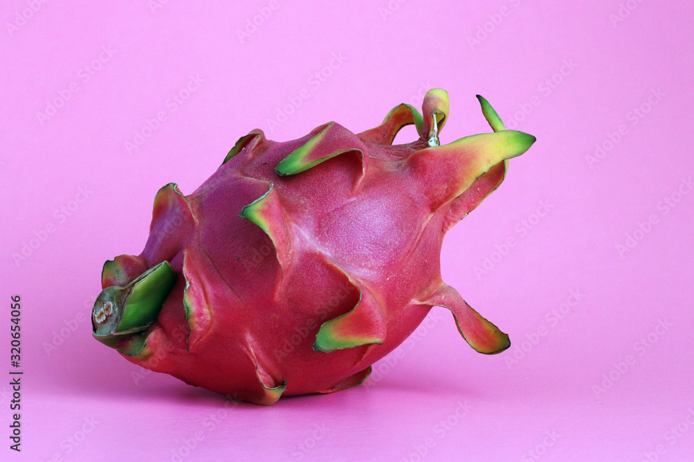 Dragon fruit isolated on pink background Dragon fruit isolated on pink background