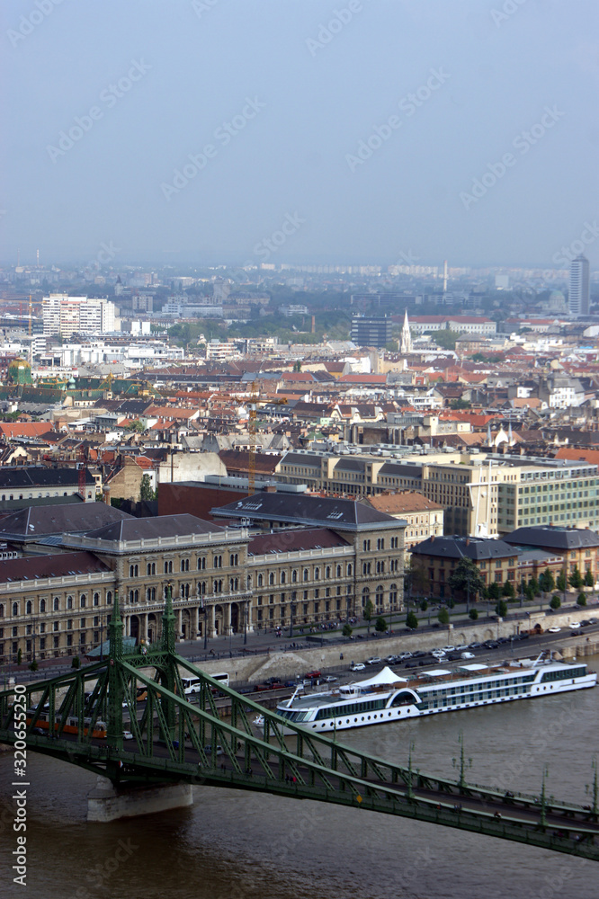 view of the bridge and the city of Budapest