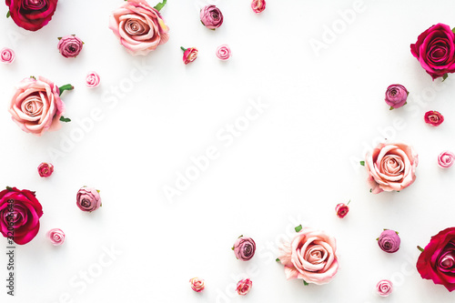 Pink flowers on white background, flat lay, top view