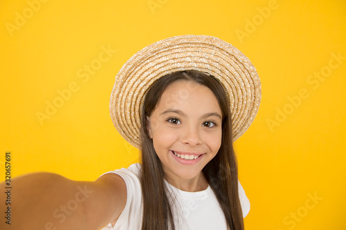 Turn back brim straw hat. Happy kid relaxing summer resort. Summer vacation outfit. Ready to relax. Teen girl summer fashion. Little beauty in straw hat. Beach style for kids. Visit tropical islands