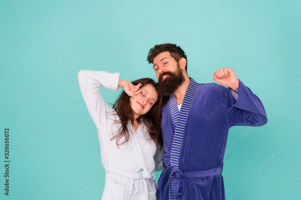 Too early. married couple morning routine. couple in love hard to wakeup. good morning. lazy start of the day. bearded man and woman wear home robe. Enjoying spending time together Too early. married couple morning routine. couple in love hard to wakeup. good morning. lazy start of the day. bearded man and woman wear home robe. Enjoying spending time together