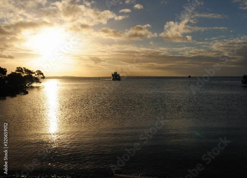 Ship Approaching Fraser Island In The Sunset Light Queensland Australia © Joerg