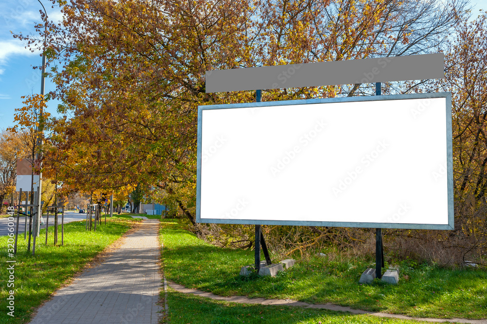 Advertising billboard mockup near the sidewalk Advertising billboard mockup near the sidewalk