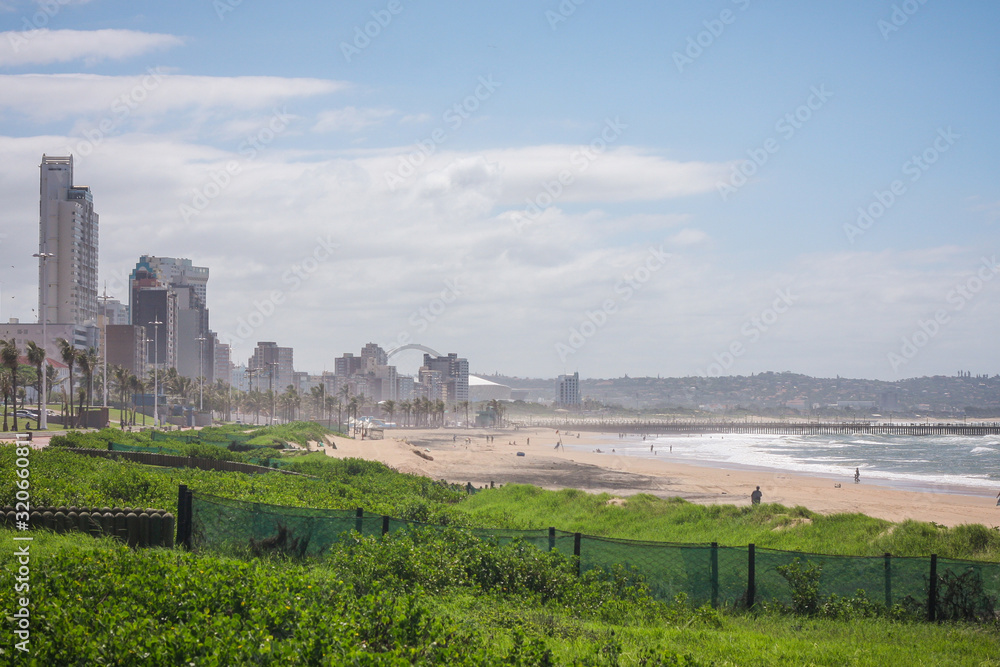 Panorama photo of Durban beachfront or cityscape. View from the gardens towards the big city skyscrapers on a sunny day.