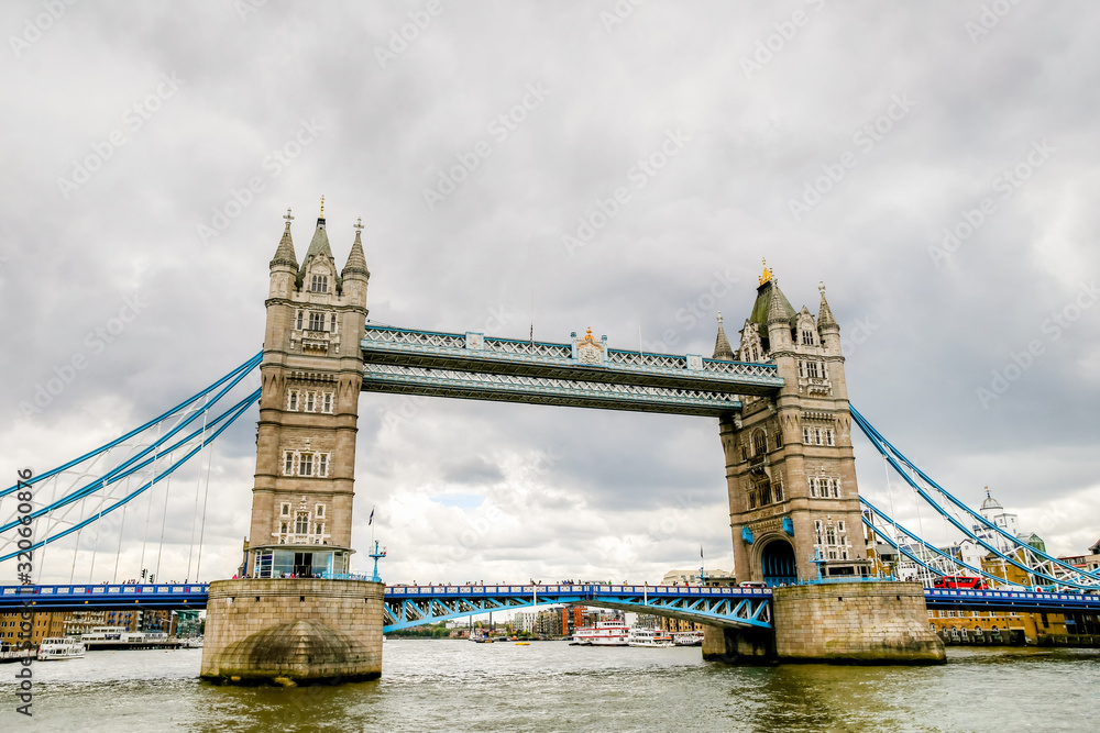 Obraz premium Tower Bridge in London as seen from the middle of the River Thames
