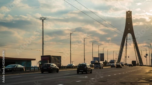 traffic on the background of sunset over the city