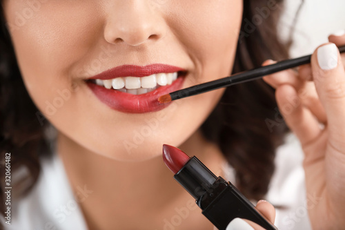 Makeup artist working with ...