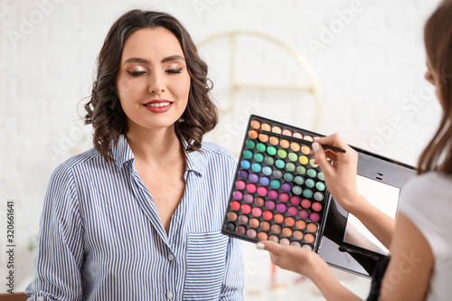 Makeup artist working with ...