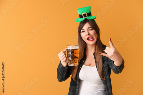 Funny young woman with beer...