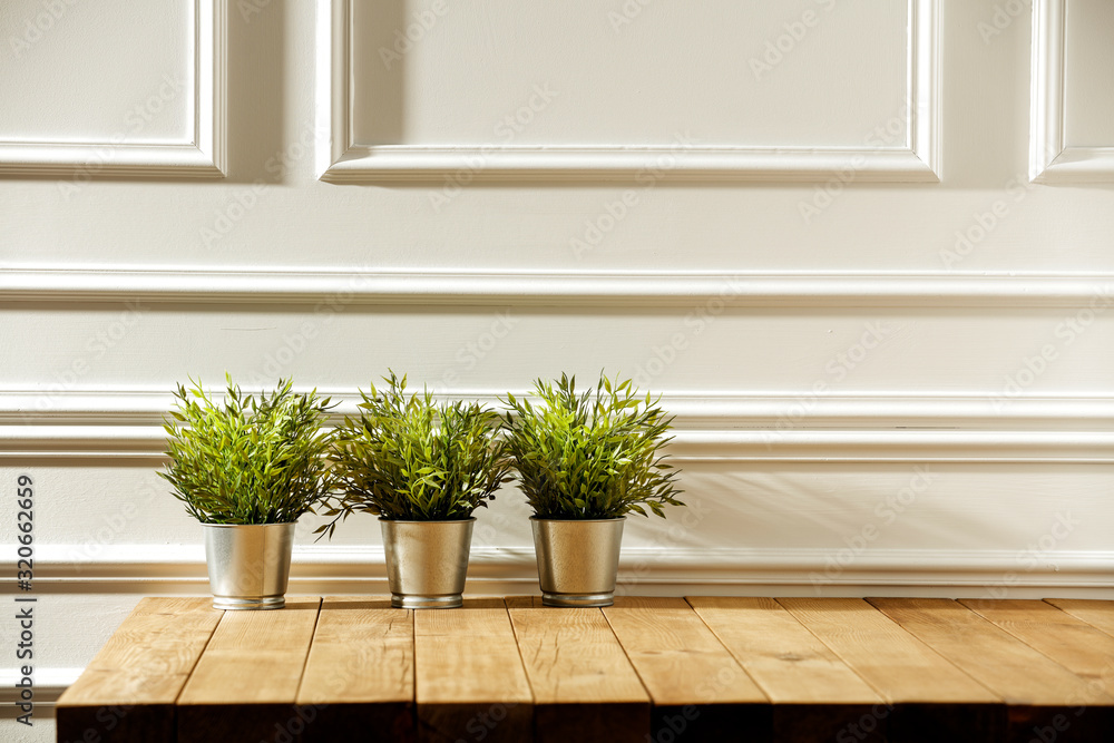 Desk of free space and white retro wall background. Desk of free space and white retro wall background.