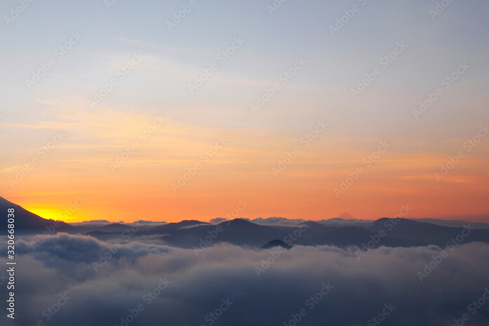 Sunset with colorful sky and many clouds over the mountains - Volcano Atitlan background - landscapes in Guatemala