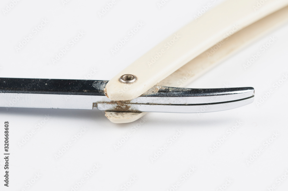 Old barber razor isolated on white background.Copy space Old barber razor isolated on white background.Copy space