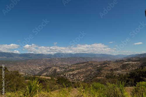 Beautiful landscape of hills and mountains in Guatemala - mountains with few trees due to deforestation and climate change - desert mota  as