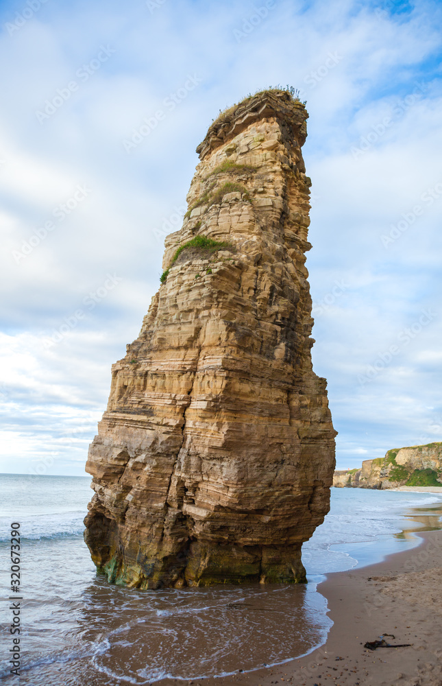 Marsden Rock and shore / Marsden Bay rocks and stacks are the result of erosion over many years. England. Marsden Rock and shore / Marsden Bay rocks and stacks are the result of erosion over many years. England.