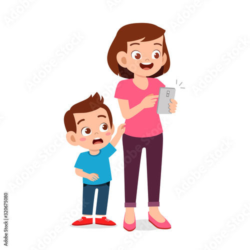 sad little kid boy ignored by parent