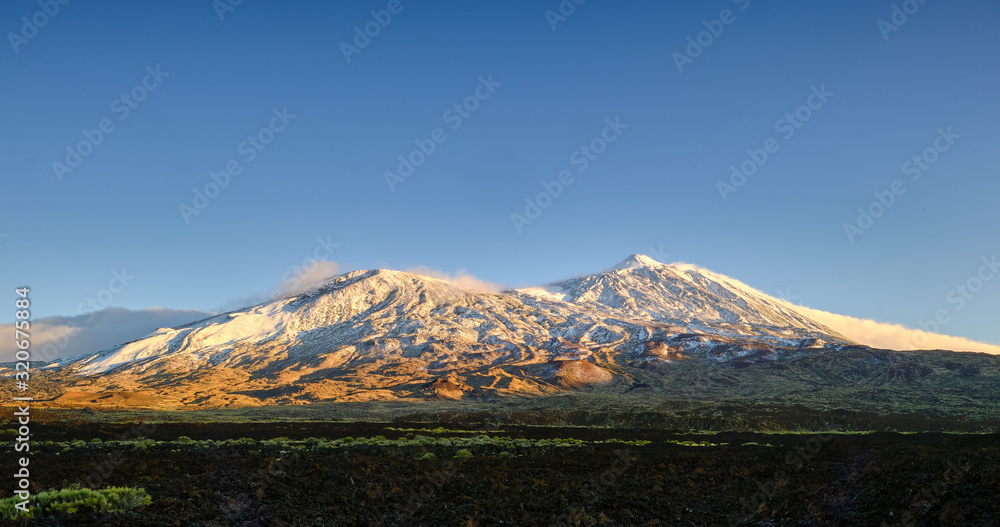 El Teide and Pico Viejo from the Boca Tauce viewpoint, Teide National Park, Tenerife, Canary Islands. Spain