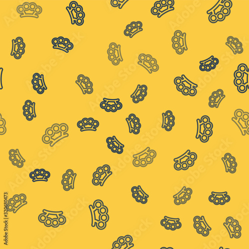 Blue line Brass knuckles icon isolated seamless pattern on yellow background. Vector Illustration