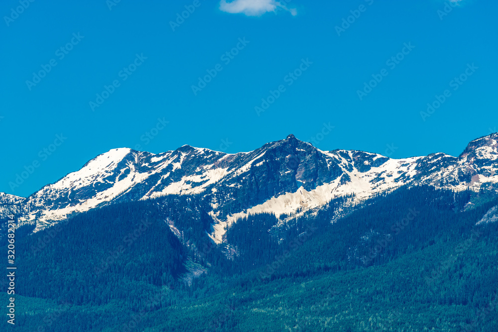Obraz premium Rocky Mountains. Mountains with white cloud in British Columbia, Canada.