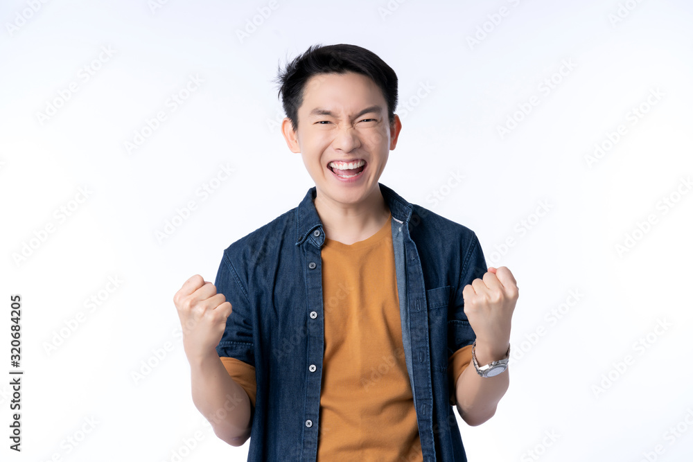 smart attractive asian friendly male hand rise up cheerful exited standing and smile with freshness and joyful casual blue shirt portrait white background smart attractive asian friendly male hand rise up cheerful exited standing and smile with freshness and joyful casual blue shirt portrait white background