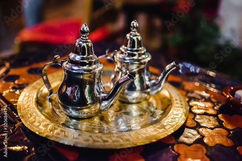 traditional Arabic tea cup, arab people drinking tea in Ramadan