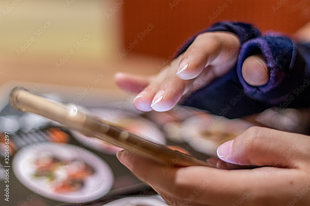 woman's hands with cell phone close up. woman's hands with cell phone close up.