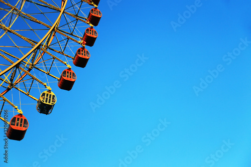 Ferris Wheel part shot with blue sky background at Osaka, Japan