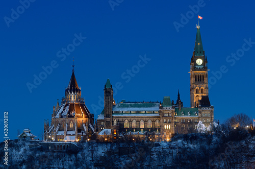 Center Block of Parliament Hill in Ottawa at dusk in winter photo