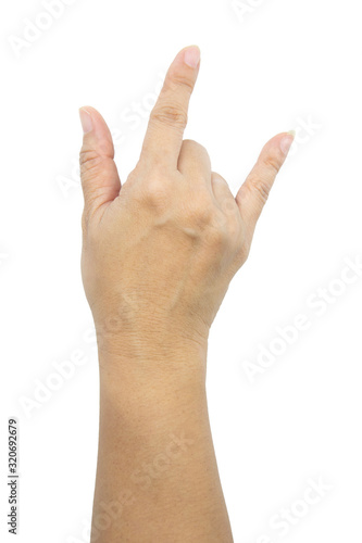 Female hand showing rock n roll sign. Hands in shape of love heart.