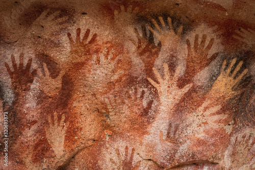 Tableau sur toile Ancient Cave Paintings of Hands at Cueva de Las Manos in Santa Cruz Province, Pa