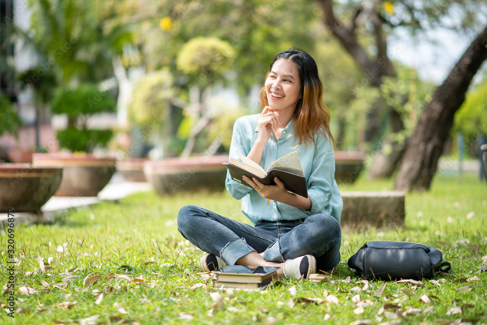 Happy young Asian University student. Happy young Asian University student.