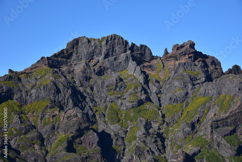 Landscape of green mountains of Madeira Island - view from the trial to Pico Ruivo.