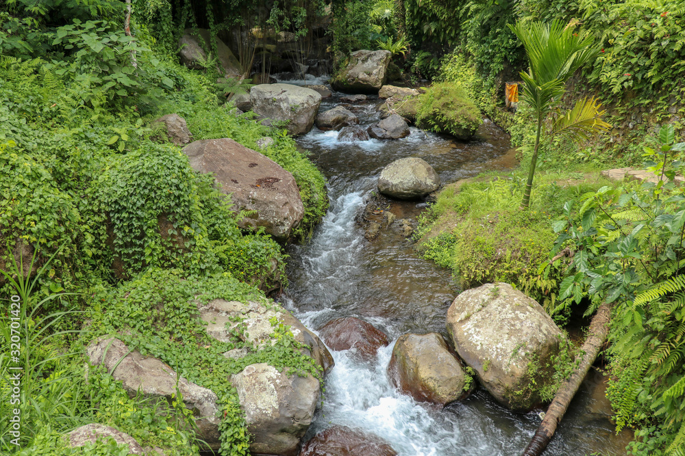River bed in Pakerisan valley with wild water and big boulders. Water
