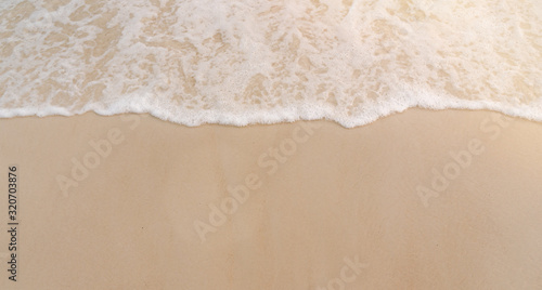 Beautiful beach sand with sea wave background