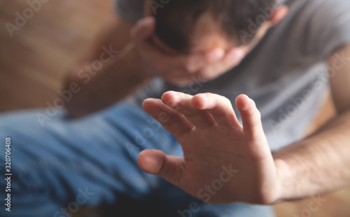 Caucasian man making stop gesture. © andranik123