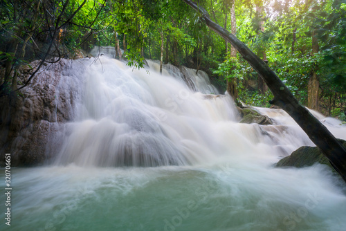 Waterfall scene at Pha Tad Waterfalls in rainforest  at the Khuean Srinagarindra National Park Kanchanaburi.