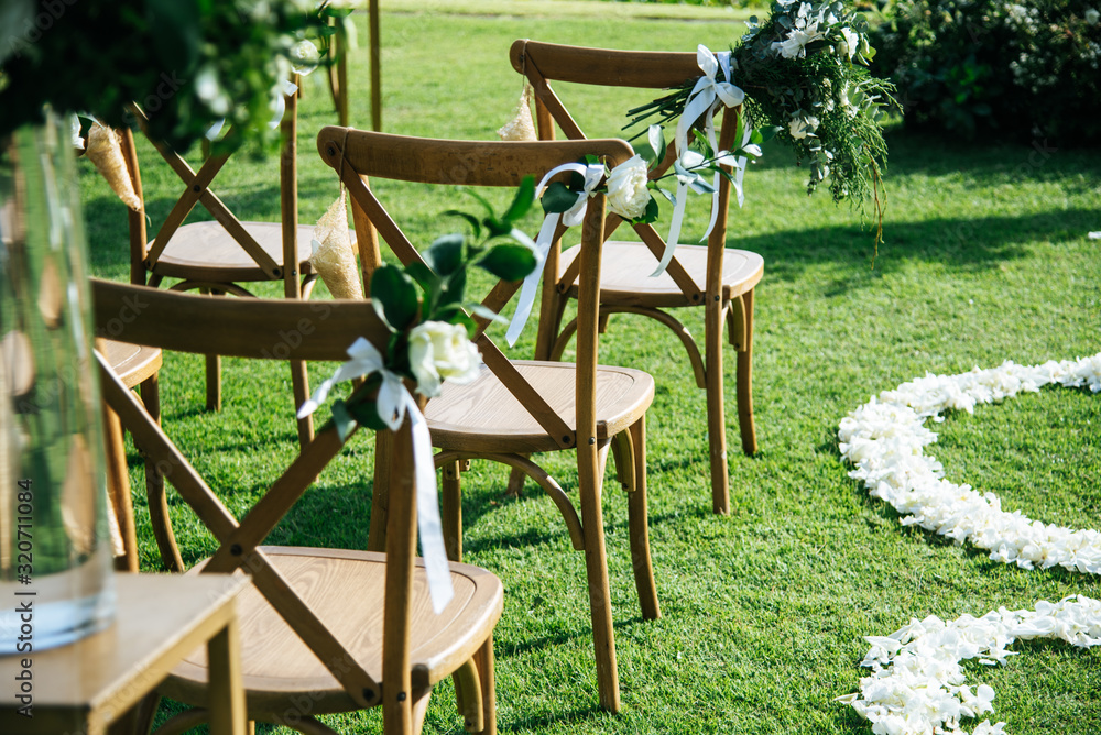 Wedding ceremony. Arch, decorated with flowers on the lawn. Wedding ceremony. Arch, decorated with flowers on the lawn.