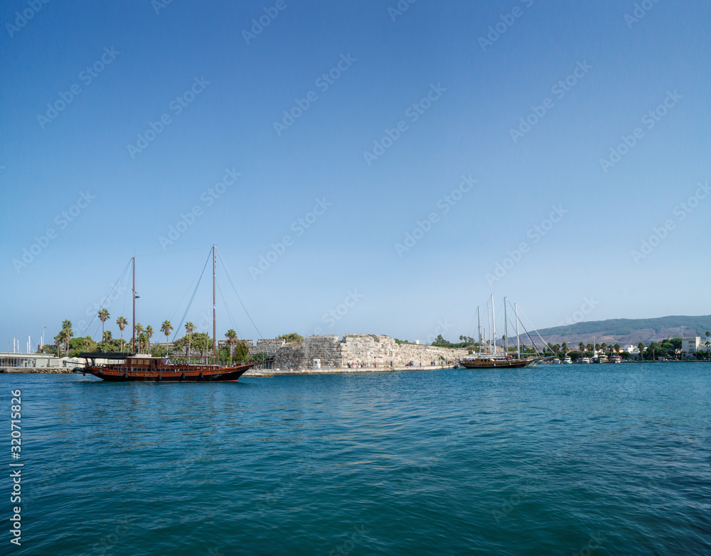 Ships and yachts in the harbour of Kos on sunny day Ships and yachts in the harbour of Kos on sunny day