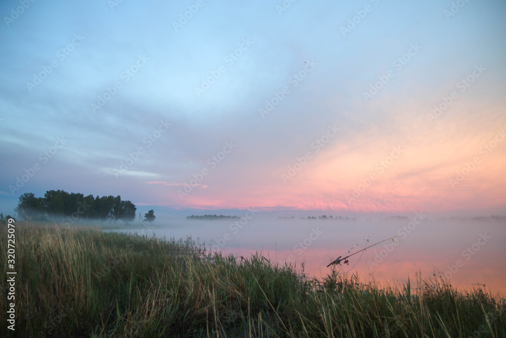 Obraz premium zachód słońca nad jeziorem