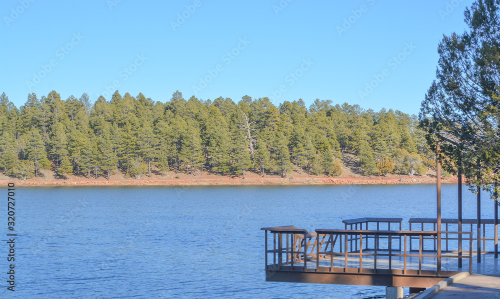 Peaceful view of a deck extended over Fool Hollow Lake in Show Low, Navajo County, Apache Sitgreaves National Forest, Arizona USA