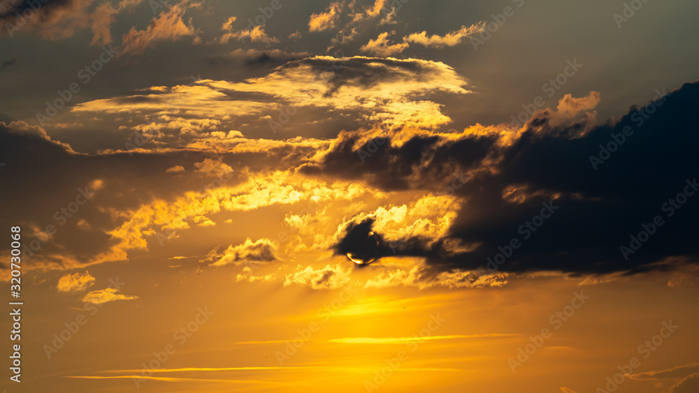 Fototapeta premium Sunset in the clouds