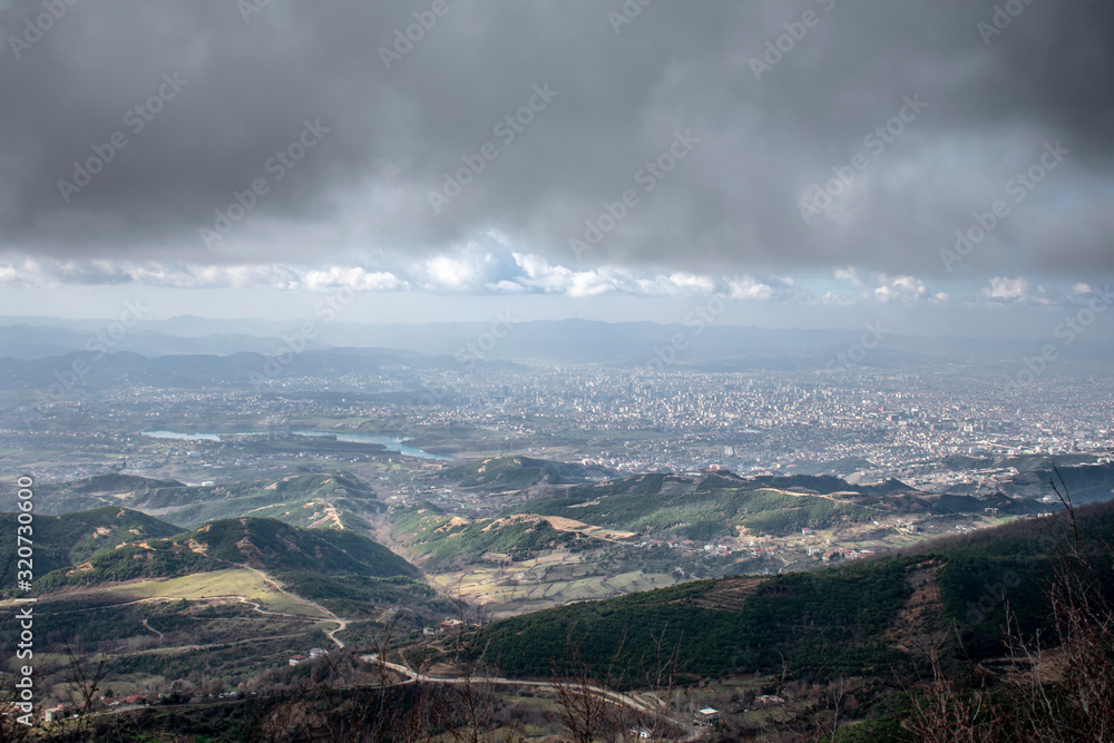 panoramic view of mountains and clouds