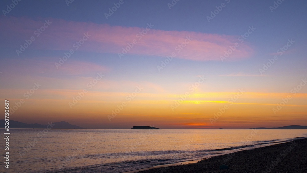 Ocean scenic with golden sunset scene. Golden colours fill the sky.