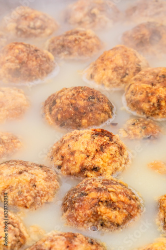 Cooked deep-fried meatballs made from cooked pork and cooked rice.Chinese food.