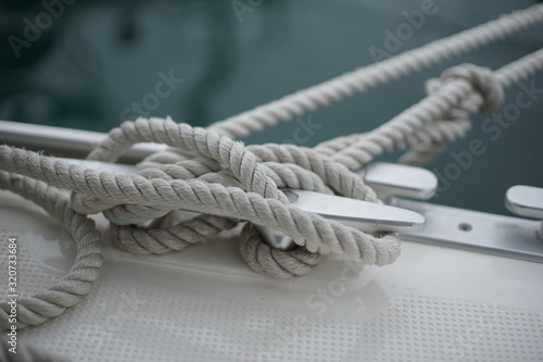 Sail boat docking line on mooring cleat 