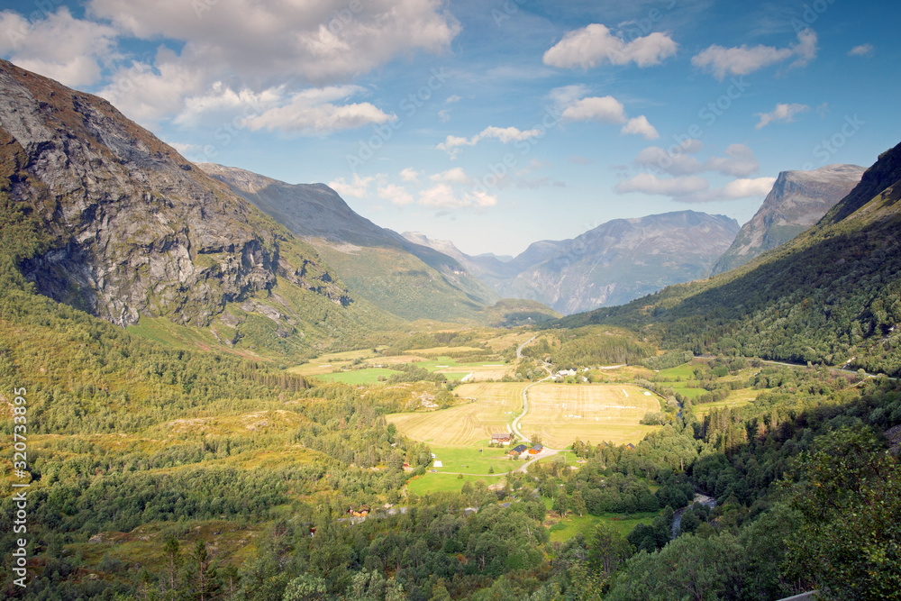 Beautiful top view mounrain summer landscape in Norway Blue sky, mountains and fjord