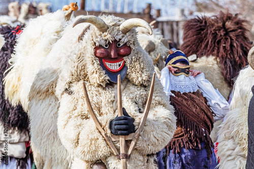 Unidentified people in masks; participants at the Mohacsi Busojaras, it is a carnival for spring greetings (Intangible Cultural Heritage of Humanity of the UNESCO).